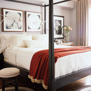 4 post bed with red blanket