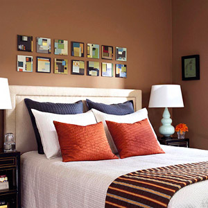 brown bedroom with blue pillows