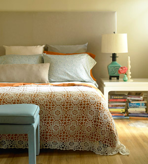 bedroom with lace coverlet