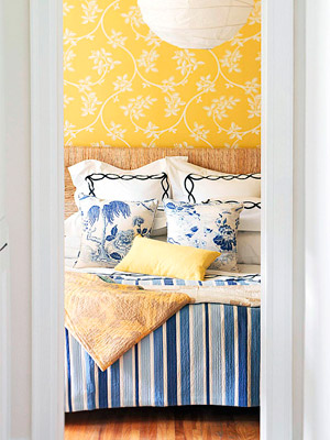 blue and yellow room with floral yellow wallpaper