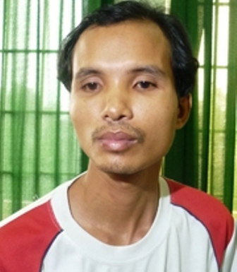 Hung thủ Nguyễn Hữu Hưng tại cơ quan điều tra
