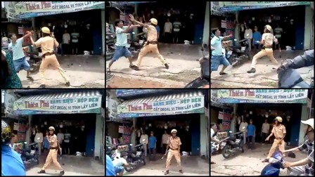 Cảnh sát cơ động mặc thường phục đánh cảnh sát giao thông. Ảnh IE