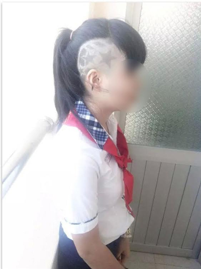 Nữ sinh đến lớp với kiểu tóc cạo trọc lạ