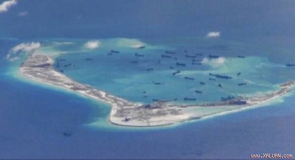 Trung Quốc vẫn ngang nhiên xây dựng cải tạo trái phép trên Đá Vành Khăn (chủ quyền Việt Nam). Ảnh: Reuters