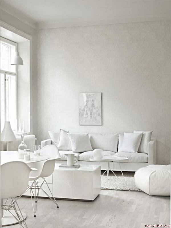 Trang trí nhà theo tông trắng luôn mang đến cho phòng khách một vẻ đẹp tuyệt đối không gì ngoài sự tinh tế và hiện đại.