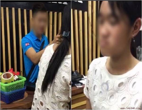  Cô gái trẻ bị chủ shop tát nhiều cái vào mặt rồi đuổi đi. Ảnh cắt từ clip.
