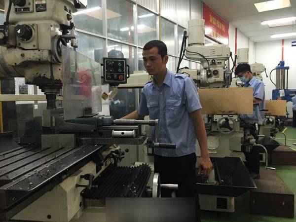 Sản xuất công nghiệp tại TPHCM có sự điều chỉnh phù hợp trước cuộc chiến thương mại Mỹ - Trung. Ảnh minh họa