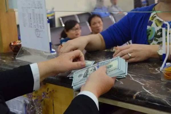 Đối tượng được vay ngoại tệ hiện thu hẹp chỉ còn 4 nhóm doanh nghiệp Ảnh: TẤN THẠNH