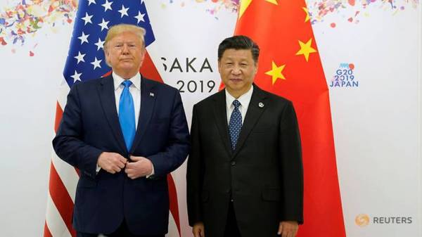 Tổng thống Mỹ Donald Trump và Chủ tịch Trung Quốc Tập Cận Bình. Ảnh: Reuters