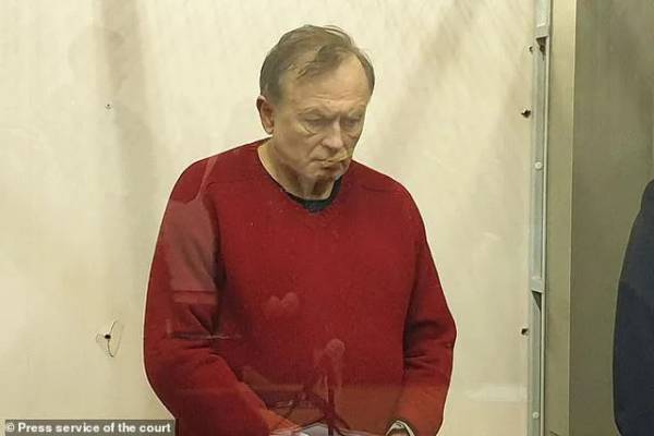 Russian professor after being arrested (Image: Dailymail)