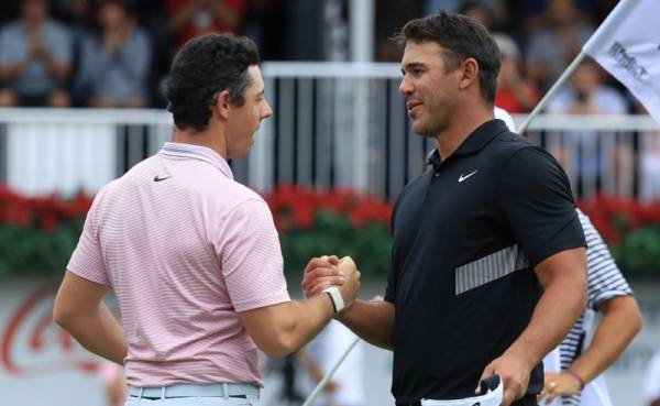 Golfer Rory McIlroy trở lại vị trí số một, đánh bại Brooks Koepka
